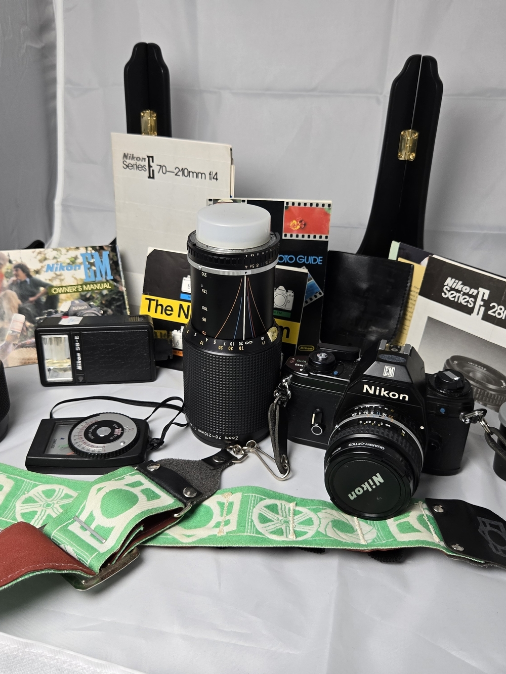 Nikon EM 35mm Film Camera Kit with 28mm, 50mm, 70-210mm Series E Lenses, SB-E Fl